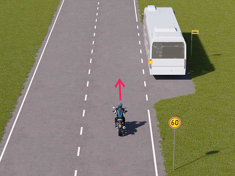 linja-auto lähdössä pysäkiltä